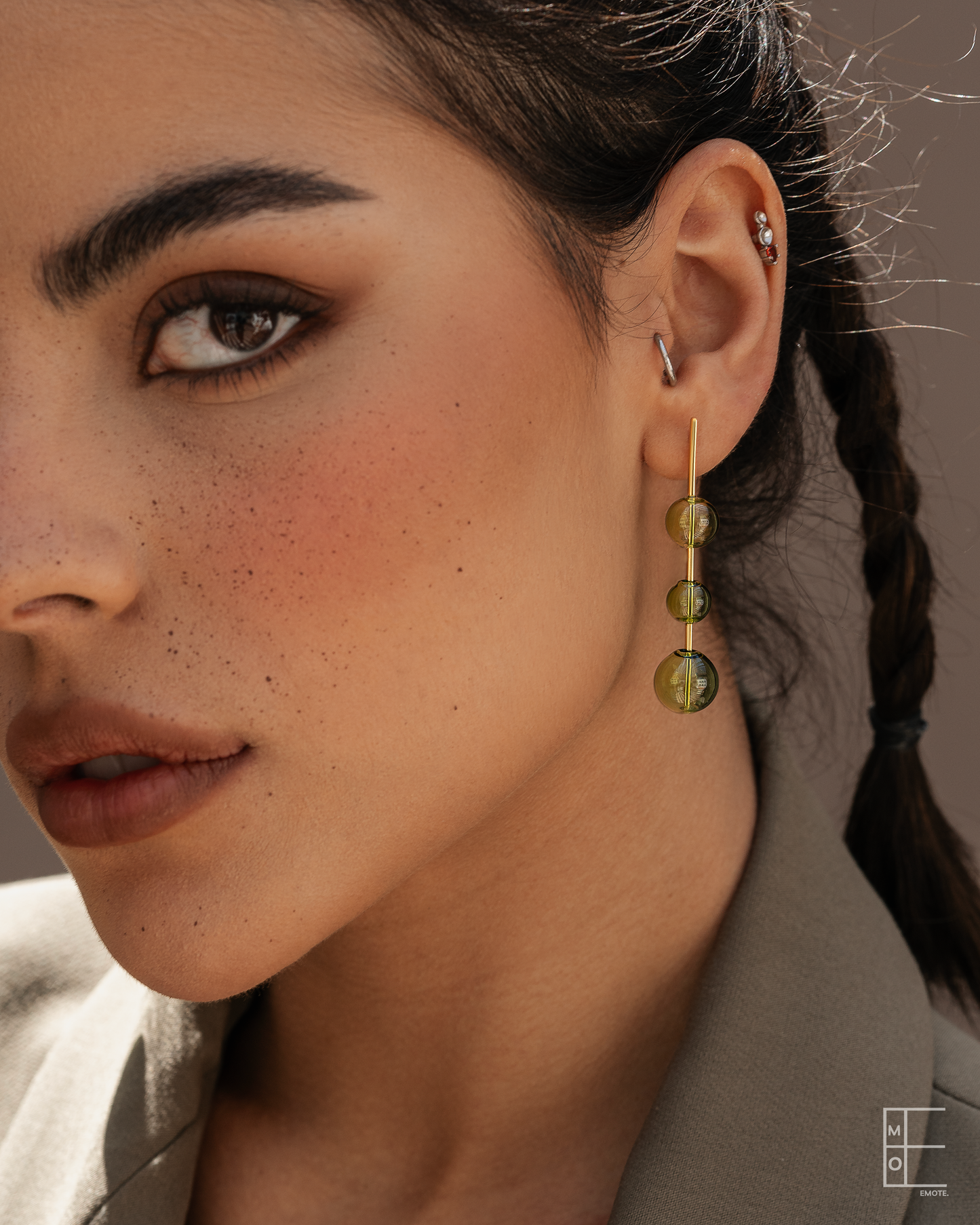 mismatched green glass stick studs